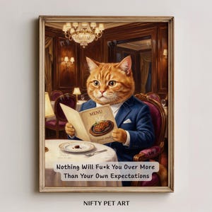May include: A framed print featuring a cat in a suit reading a menu with a fried steak illustration. The print has the text "Nothing Will Fu*k You Over More Than Your Own Expectations" and "NIFTY PET ART". The cat is in a restaurant setting.
