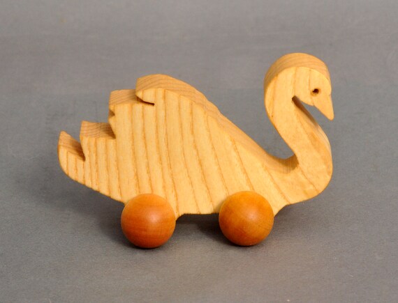 wooden toy duck on wheels