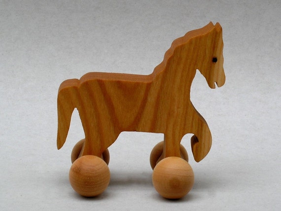 wooden horse on wheels