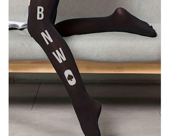 May include: Black thigh-high stockings with white text spelling "BNWO" and a white spade symbol. The stockings are made of a sheer material and are worn on a person's legs.