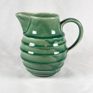 Vintage 1930s unmarked Bauer Ringware Pottery Beehive Pitcher with green glaze