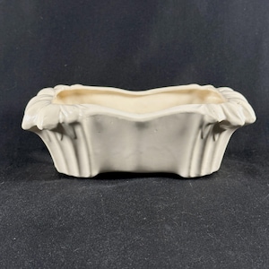 May include: A handmade wooden sign with the text "Welcome" in a playful font. The sign features a distressed white background and a dark brown frame, perfect for a front door or entryway. The sign measures approximately 12 inches wide and 6 inches tall.