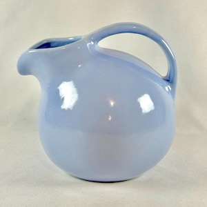 Vintage 1940s light blue Niloak Pottery Art Deco Tilted Ball Pitcher with Ice Lip
