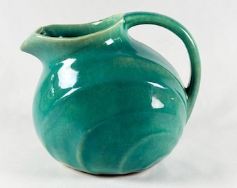 Vintage 1940s unmarked McCoy art pottery glossy teal ball water pitcher with ice lip