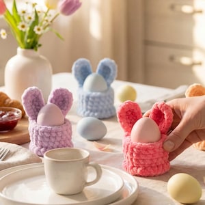 May include: A rustic wooden sign with the text "Welcome to our home" in white lettering. The sign features a distressed finish and a simple, inviting design, perfect for front door decor.