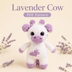 May include: A crochet plush toy of a cow with white and lavender yarn, featuring large black safety eyes, a lavender snout, and lavender spots. The text Lavender Cow PDF Pattern is displayed above the plush toy on a light background.