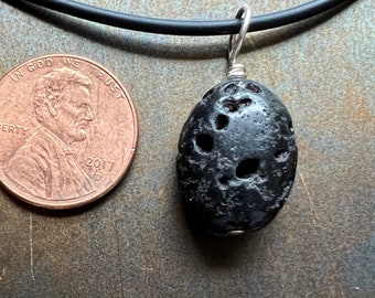 VOLCANIC. solitary stone pendant or charm. Sundance style. minimalist pendant. waxed black lava stone.