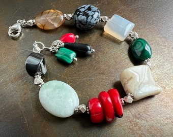 ENDURANCE. one of a kind natural stone bracelet. green black red beige. agate. jade. red coral. malachite. snowflake obsidian. star sign.