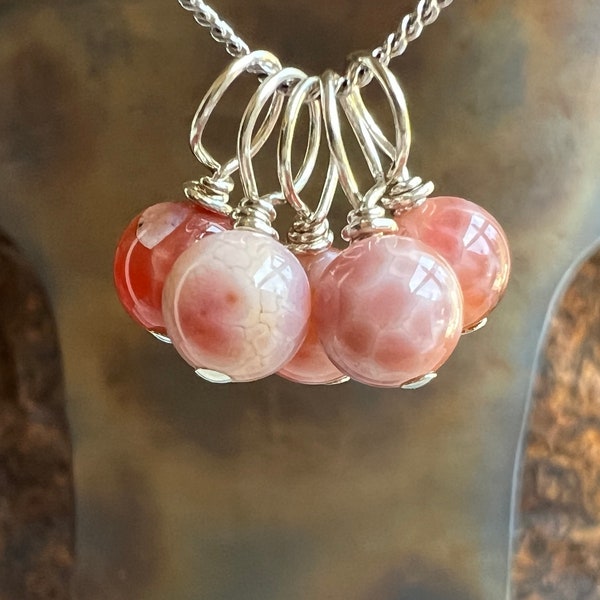 crab fire agate pendant. CALM. handmade pendant. unique natural stone. peach cream tangerine orange. solitary stone. Sundance style. cool!