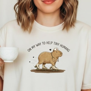 Comfort Colors Pediatrics T-Shirt PEDS Nurse Pediatrician Gift Funny Capybara On My Way To Help Tiny Humans PEDS Humor Pediatric Nurse PICU