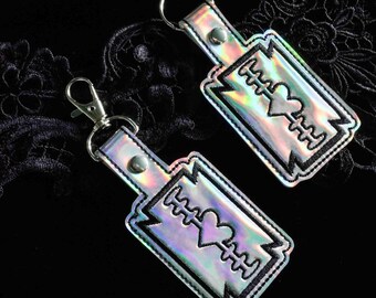 Razor Blade Embroidered Keychain - Silver Holographic Vegan Leather with Silver Hardware