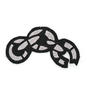 May include: Black and white embroidered patch of a motorcycle with a silver outline.