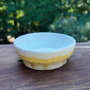 White and Yellow Ceramic Bowl
