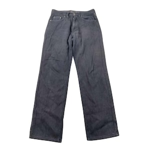 May include: Dark gray denim jeans with a classic five-pocket design. The jeans have a straight leg cut and a button and zipper closure. The fabric appears to be a medium-weight denim, suitable for everyday wear. The jeans are displayed on a white background.