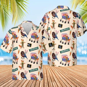 May include: A short-sleeved button-down shirt with a repeating pattern of characters and elements from the animated film "Zootopia." The shirt is primarily cream-colored, with images of a fox, a rabbit, and other characters. The word "Zootopia" is also visible.