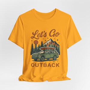 Let’s Go Outback graphic shirt with retro SUV illustration, camping adventure design, boho vintage tee for Subaru fans and road trips
