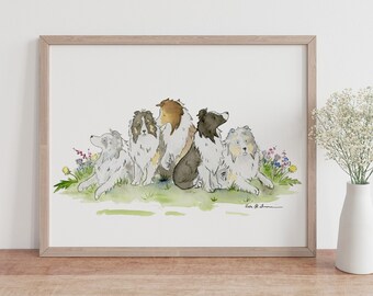 May include: Watercolor print of five dogs, each with unique markings in shades of white, brown, and gray. They are depicted sitting on green grass with colorful wildflowers. The artwork is framed in a light wood frame and displayed on a wooden surface.