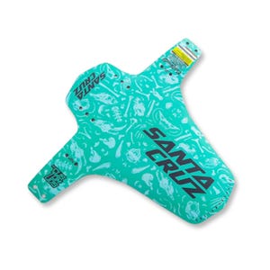May include: A turquoise bicycle mudguard featuring a bone and skull design and the words "SANTA CRUZ" in black. The mudguard has a rectangular shape with a long, narrow extension and multiple mounting holes.
