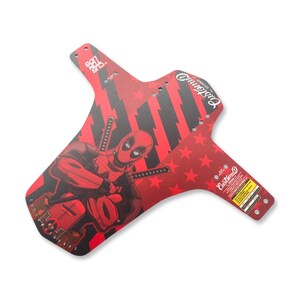 May include: Red and black bicycle mudguard with a Deadpool graphic. The mudguard has a red and black striped pattern with red stars. The Deadpool image is in the centre, with the character holding two swords. The mudguard has the words "Custom D Guard" printed on it.