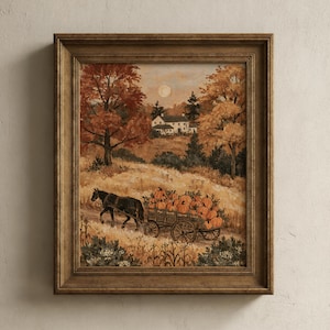 Peut inclure: Une impression d'art encadrée représentant un paysage rural d'automne avec une charrette en bois tirée par un cheval et remplie de citrouilles orange. La scène montre une maison blanche au loin, des arbres aux couleurs automnales et une lune pâle.