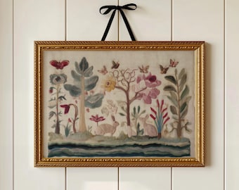 May include: Embroidered artwork in a gold frame, depicting a whimsical garden scene with rabbits, butterflies, and colorful flowers. The artwork is framed and hung with a black ribbon, adding a touch of elegance to the piece.