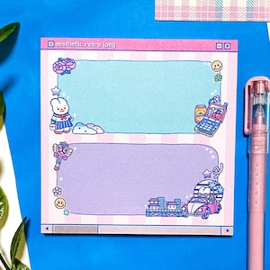 May include: Aesthetic retro notepad with a light blue and purple color scheme. The notepad features cartoon illustrations of a bunny, a car, and a cell phone. A pink pen is next to the notepad. The notepad has the text "aesthetic retro.jpeg".