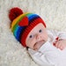 Reviewed by Anonymous reviewed Baby hats, Rainbow with pom pom, gender neutral, infant winter hat for babies