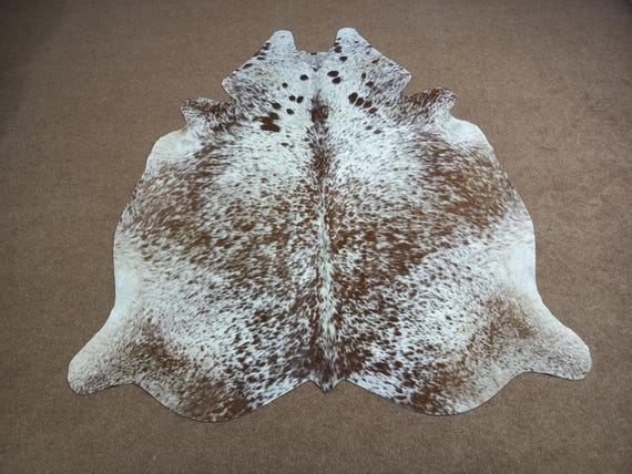 Brown & White Speckled Cowhide Rug: Rustic Western Decor