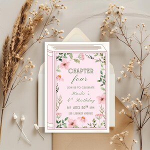 May include: A pink birthday invitation in the shape of a book, featuring the text "CHAPTER four" and details for "Harlie's 4th Birthday." The design includes floral illustrations and is set against a neutral backdrop with dried flowers.