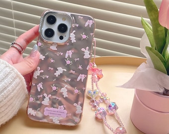 Lovely iPhone 15/14/13/12/MAX case/Cute Bunnies/Rabbits/Flowers/Bows/Shiny Lase White/Pink TPU Cover with Lase Colorful Beads Phone Chain