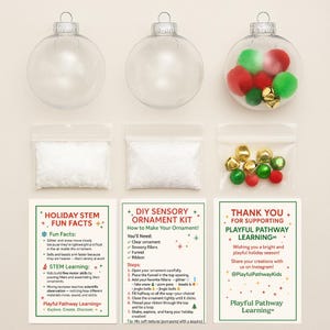 May include: A DIY sensory ornament kit with clear plastic ornaments, sensory fillers, a funnel, and ribbon. The kit includes instructions and fun facts about STEM learning. The ornaments are filled with glitter, pom-poms, beads, and jingle bells.
