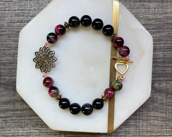 Pulsera de ojo de tigre verde/rosa de inspiración malvada
