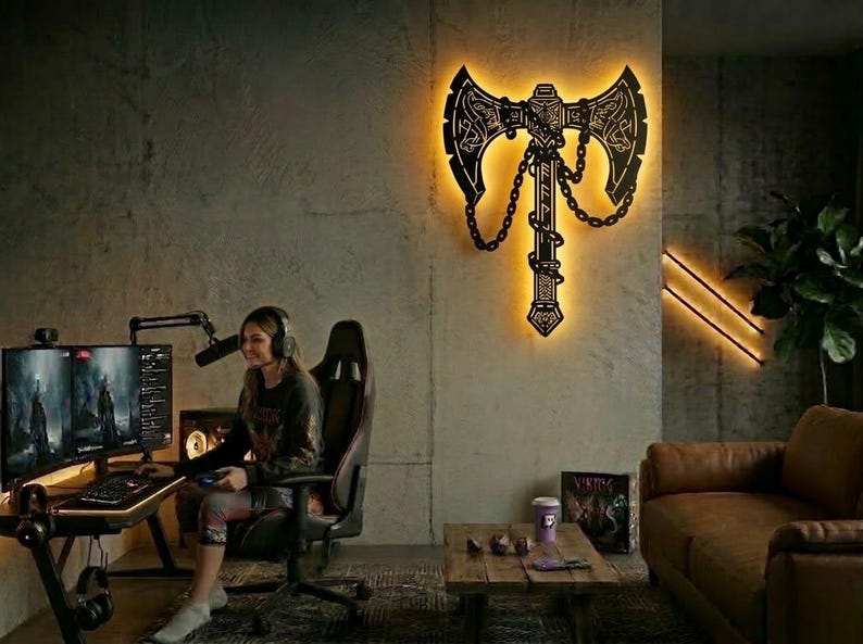 Viking battle axe silhouette for laser cutting and CNC. Professional Norse warrior weapon vector file in Svg Dxf format. High-detail metal wall art for LED backlit home decor from **dxfdesignco art**.