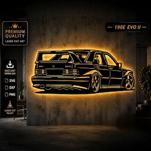 May include: A black laser-cut art piece of a 190E EVO II car, illuminated with a warm glow. The artwork includes the text "PREMIUM QUALITY LASER CUT ART" and "INSTANT DOWNLOAD" with file type icons. The text "190E EVO II" is also present.