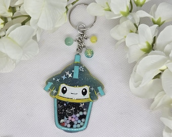 Galaxy themed Jirachi boba cup shaker keychain