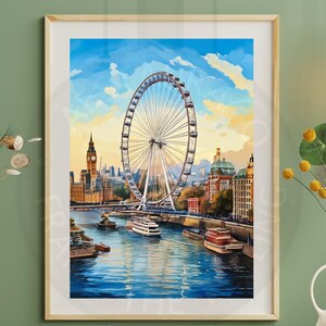 May include: A framed watercolor painting depicts the London Eye Ferris wheel, Big Ben, and boats on the Thames River. The artwork features a blue sky with clouds and buildings along the riverbank. The frame is a light wood color.