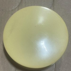 Vintage creamy yellow lucite powder compact with mirror
