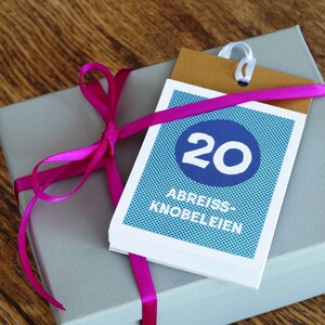 Puzzles, Sudoku, brain teasers in a small tear-off pad, a gift for puzzle fans aged 12 and up, a small present for Easter, for birthdays Petrolblau