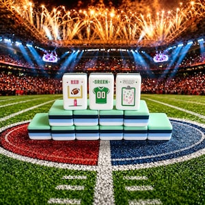 May include: A set of rectangular tiles stacked in a pyramid formation. The top three tiles feature illustrations of a football goalpost with the text RED, a green jersey with the number 00 and the text GREEN, and a clipboard with the text SOAP.