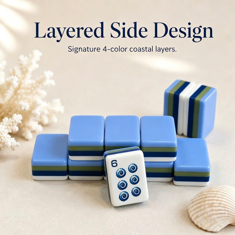 May include: A set of blue, white, and green layered tiles. One tile shows the number 6 and blue swirl designs. The text "Layered Side Design" and "Signature 4-color coastal layers" are visible.