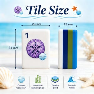 May include: Two Mahjong tiles with ocean-themed art. One tile is white with a purple sand dollar and seashell, measuring 3.1 cm x 2.3 cm. The other tile is striped with blue, green, and white, measuring 1.5 cm. The text "Tile Size" is at the top.