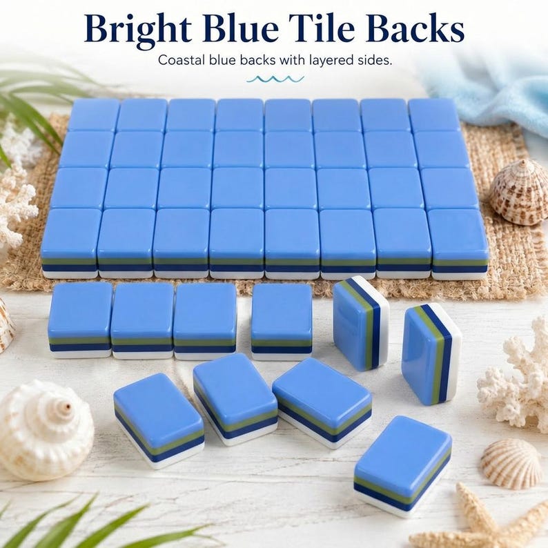 May include: Bright blue tile backs with layered sides. The image displays a set of bright blue tiles, some arranged in rows, others scattered. Each tile features a layered design with green and white accents. The text "Bright Blue Tile Backs" is at the top.