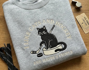 Grumpy Cat on Puck Embroidered Sweatshirt, I Like Cats and Hockey Crewneck, Funny Cat Lover Gift, Ice Hockey Fan Apparel, Game Day Top