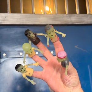 Zombie Finger Puppet – Gory Halloween Gift with Exposed Brains, Missing Limbs & Undead Attitude