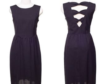 VTG 1980s sleeveless black dress by Lantz, LBD with bows down back, size S