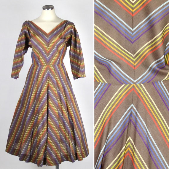 Vintage 1950s full swing dress with rainbow stripes in chevron style pattern dolman sleeve