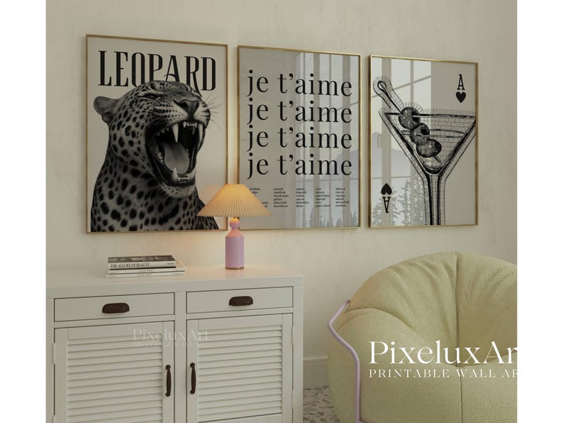 May include: Three framed wall art prints. The first features a black and white leopard with the word "LEOPARD". The second print says "je t'aime" repeatedly. The third print is a martini glass with playing card symbols.