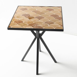 May include: A set of three ceramic mugs with a speckled, cream-colored glaze. Each mug features a different hand-painted floral design in shades of blue, green, and yellow. The mugs have a simple, rounded shape and a comfortable handle.