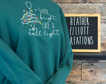 Sudadera navideña para personal sanitario – Edición con luz de llamada, enfermero/a, auxiliar de enfermería, asistente