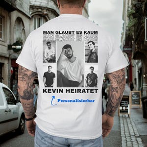 May include: White t-shirt with a design featuring multiple black and white photos of a man. The text "MAN GLAUBT ES KAUM" is printed above the photos, and "KEVIN HEIRATET" is below. The word "Personalisierbar" is also included.